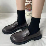 Round Toe Leather Loafers.