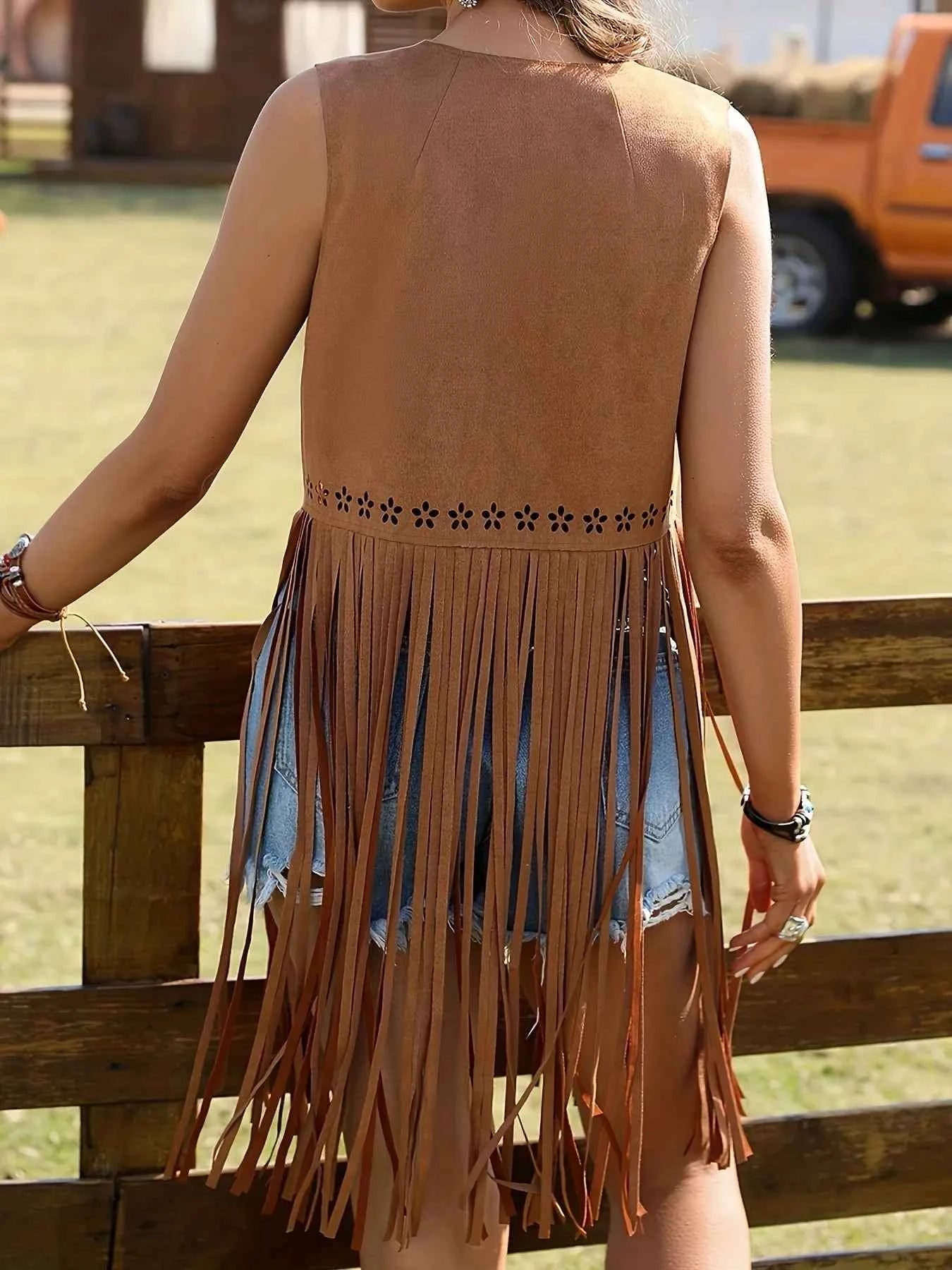 Fringe Cutout Detail Sleeveless Vest Coat.