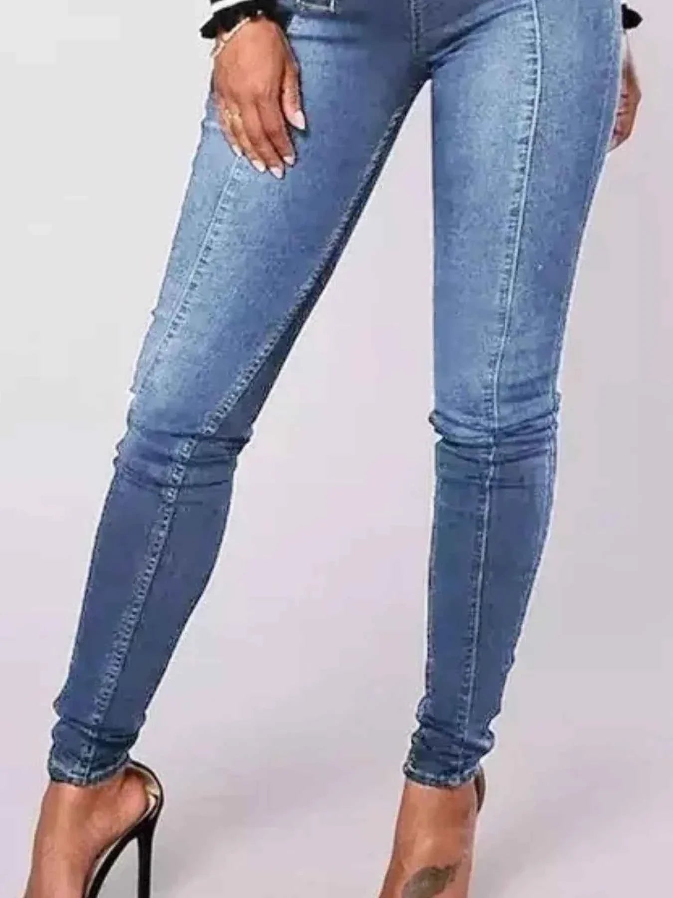 Full Size High-Waisted Double-Breasted Skinny Jeans Plus Size.