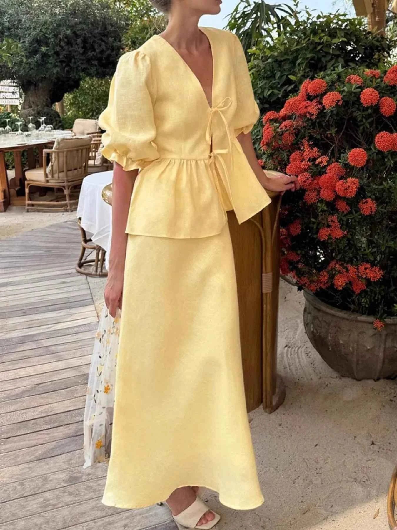 Lace-Up Tie Front Peplum Top and Skirt Set.