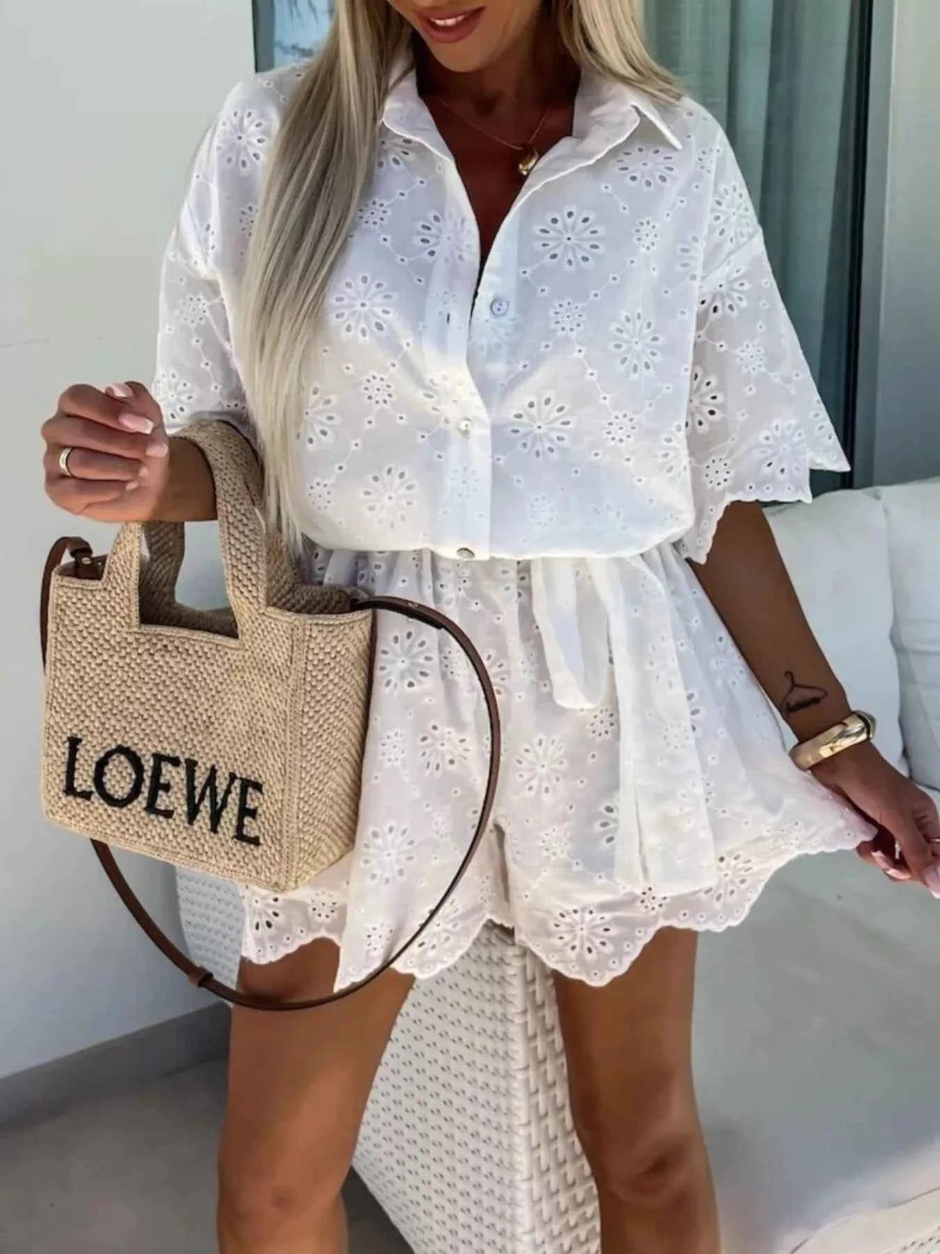 Eyelet Lace Button-Up Romper.