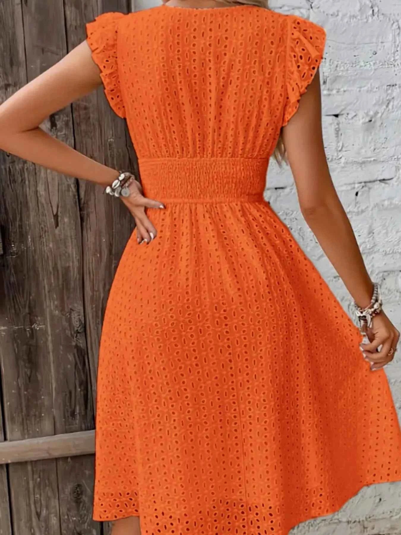 Eyelet Ruffled Cap Sleeve Mini Dress.