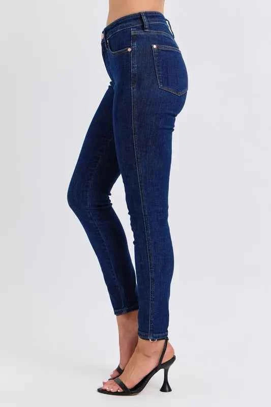 Judy Blue Plus Size Mid Rise Tummy Control Skinny Jeans.