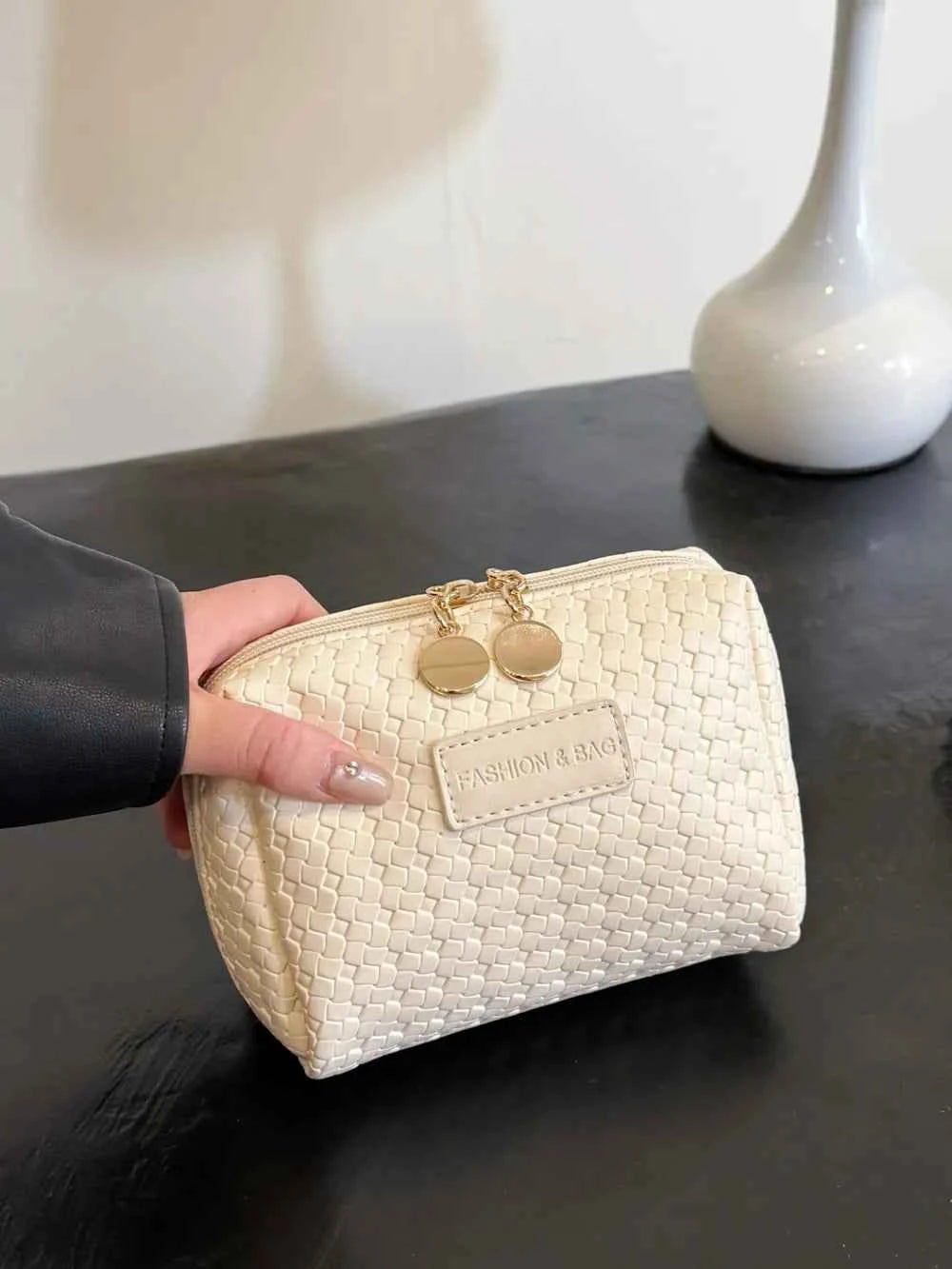 PU Leather Woven Clutch Bag.