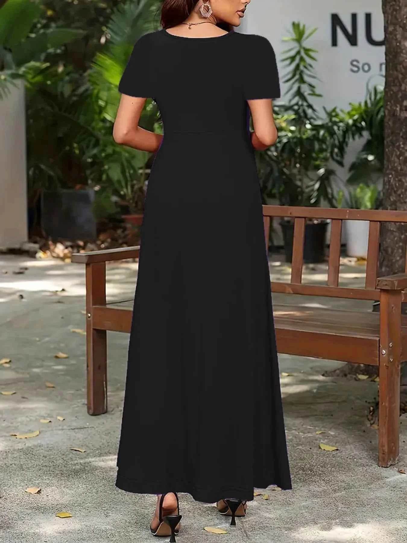 Plus Size A-Line Maxi Dress with Round Neck and Short Sleeves.