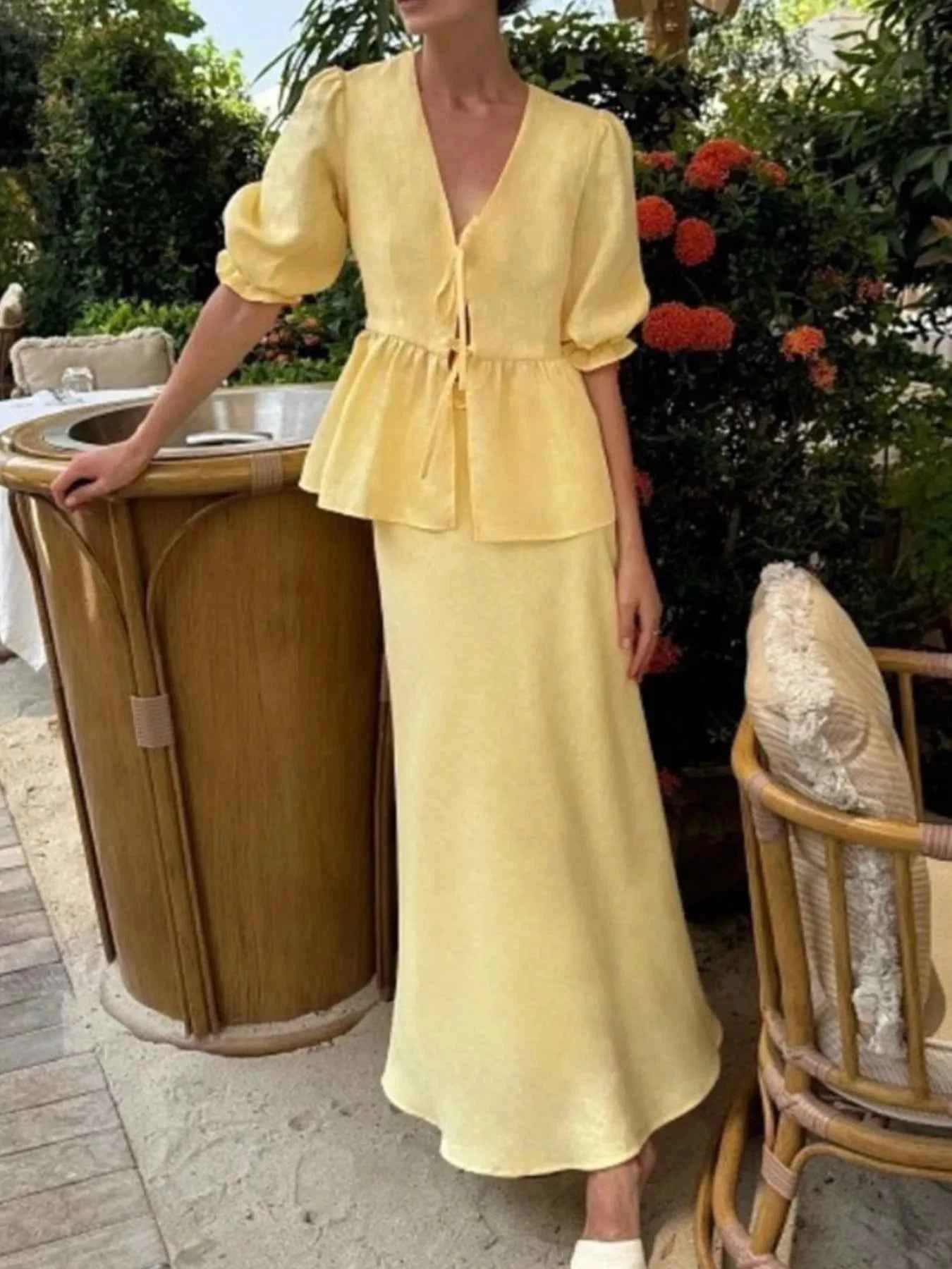 Lace-Up Tie Front Peplum Top and Skirt Set.