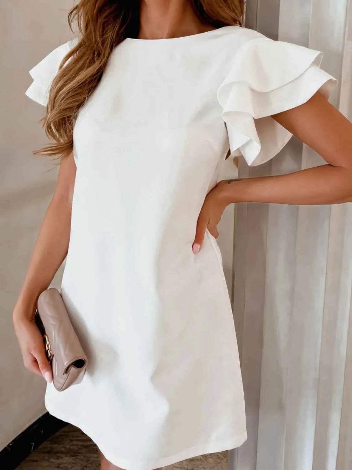 Ruffled Layered Backless Mini Dress.