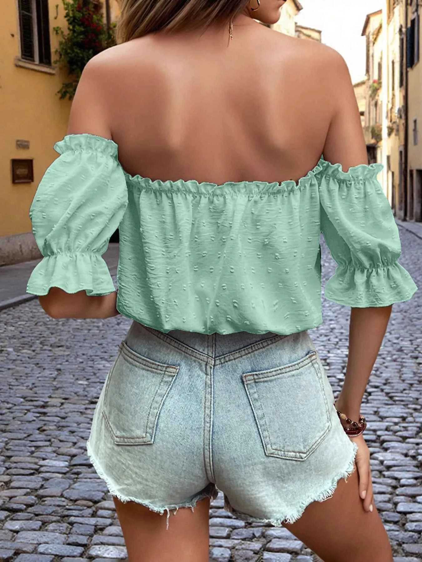 Off-Shoulder Swiss Dot Blouse with Tie Front.