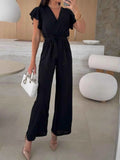 Surplice Wide Leg Belted Jumpsuit.