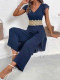 V-Neck Wide Leg Jumpsuit with Ruffles.