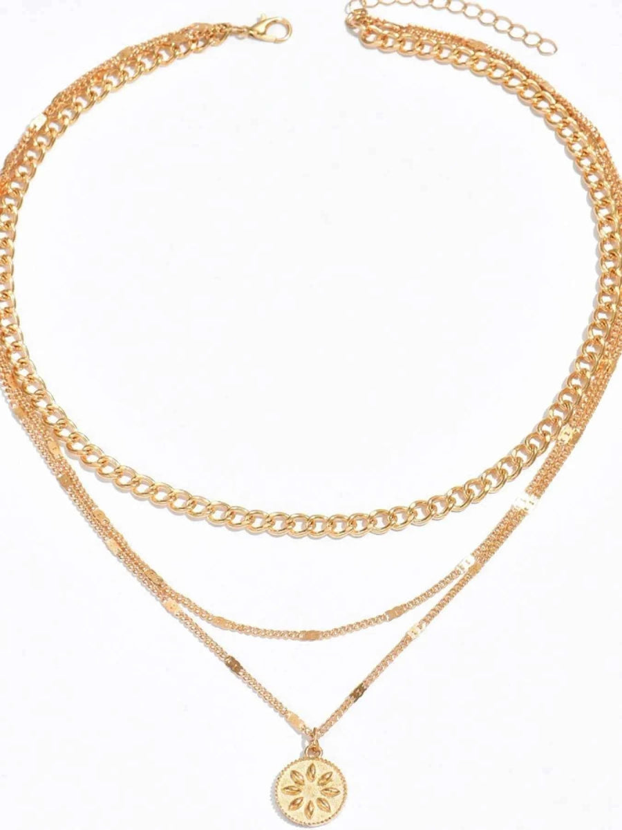18K Gold-Plated Layered Necklace with Sun Medallion Pendant.