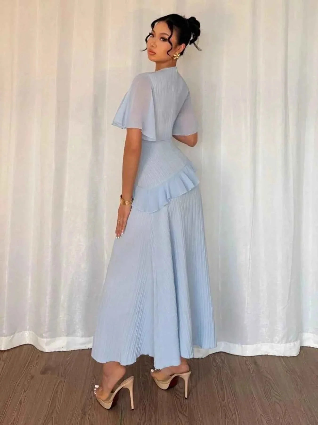 Ruffled Round Neck Flutter Sleeve Dress.