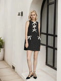 Bow Front Polka Dot Sleeveless Dress.