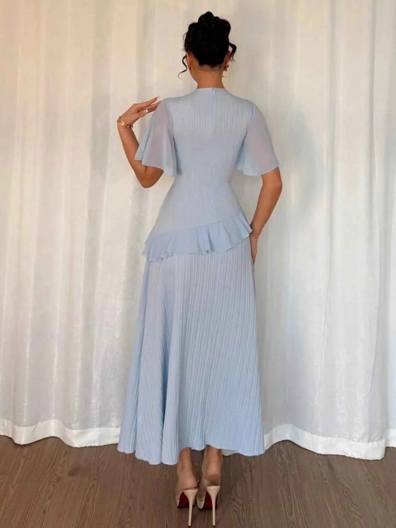 Ruffled Round Neck Flutter Sleeve Dress.