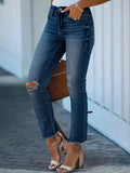 Distressed High-Waisted Skinny Jeans.