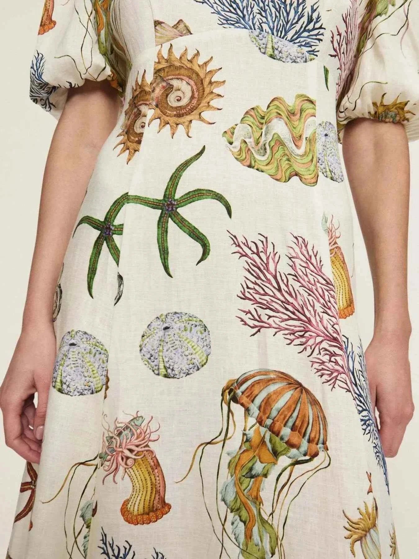 Printed Round Neck Puff Sleeve Dress.