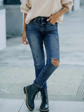 Distressed High Waist Jeans.