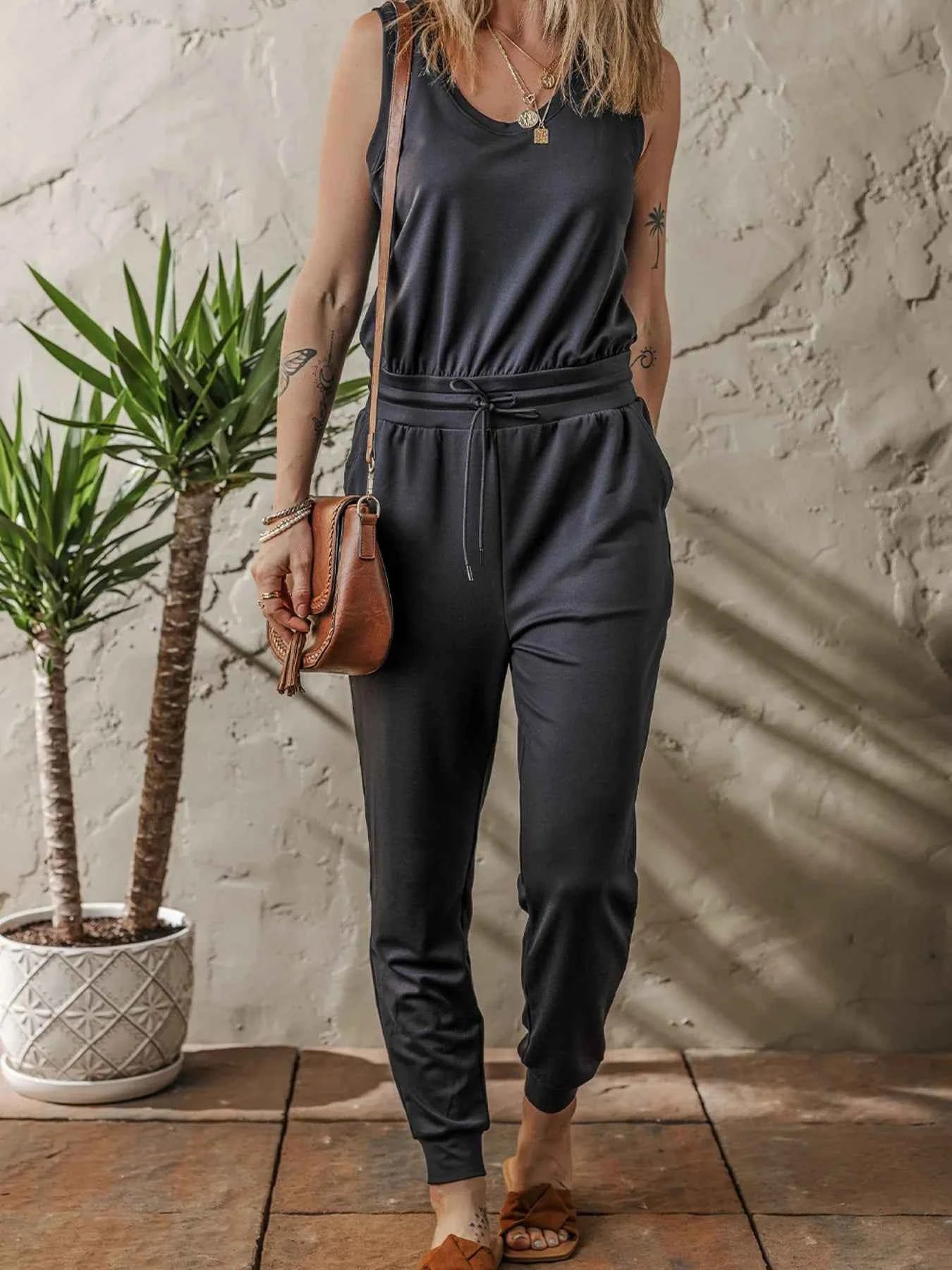 Tie Waist Sleeveless Jogger Jumpsuit.
