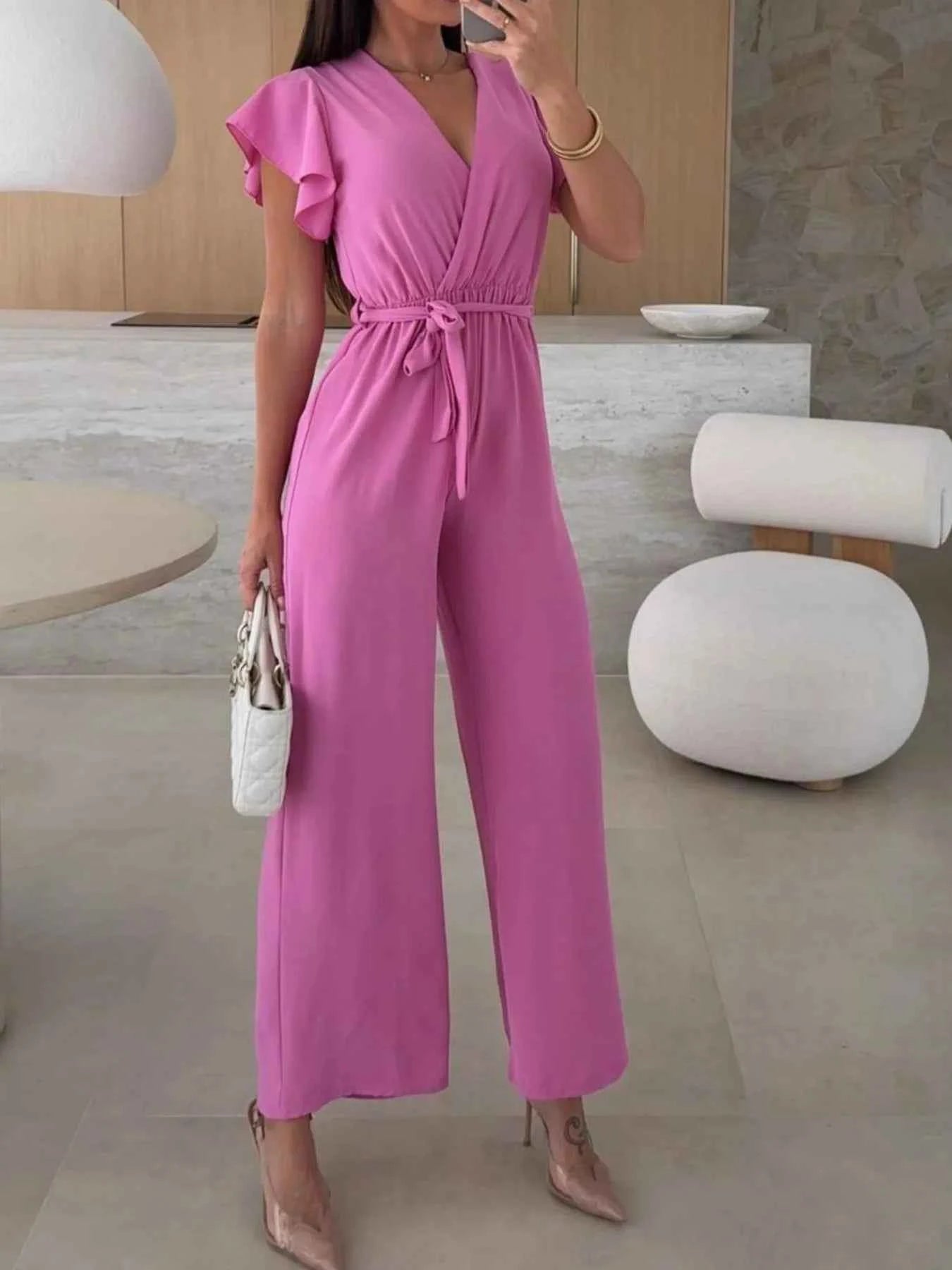 Surplice Wide Leg Belted Jumpsuit.
