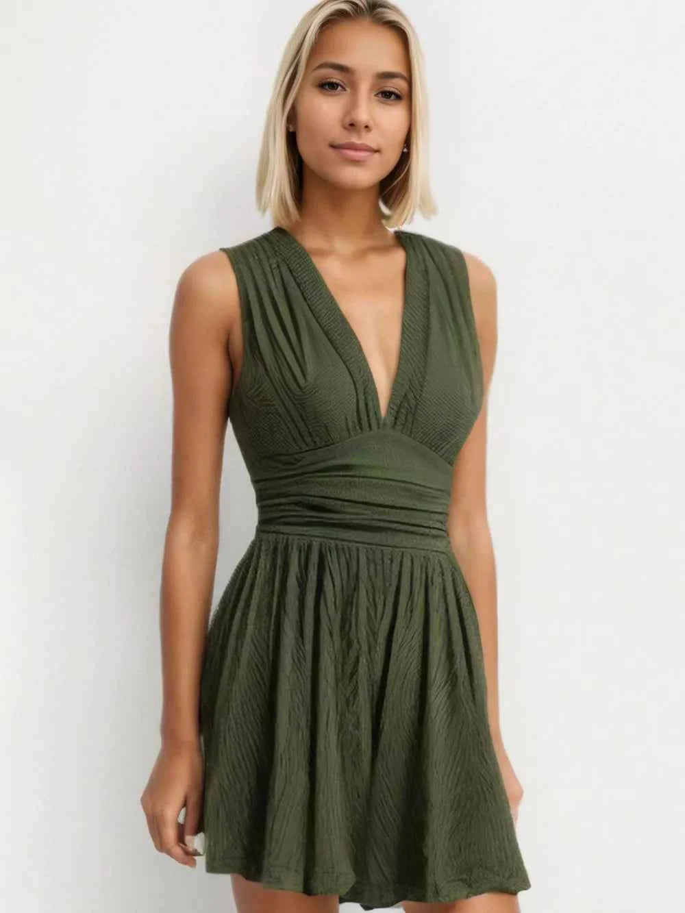 Ruched Plunge Sleeveless Romper.