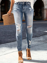 Distressed Skinny Jeans.