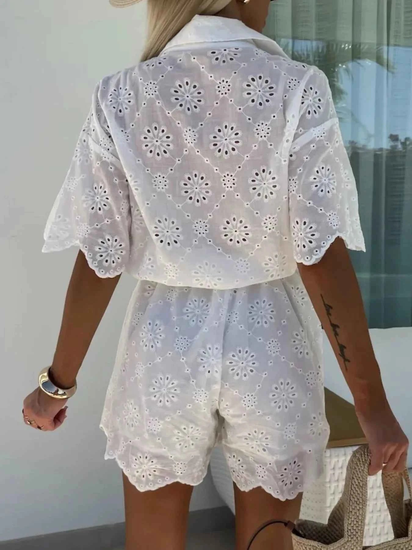 Eyelet Lace Button-Up Romper.