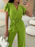 Surplice Wide Leg Belted Jumpsuit.