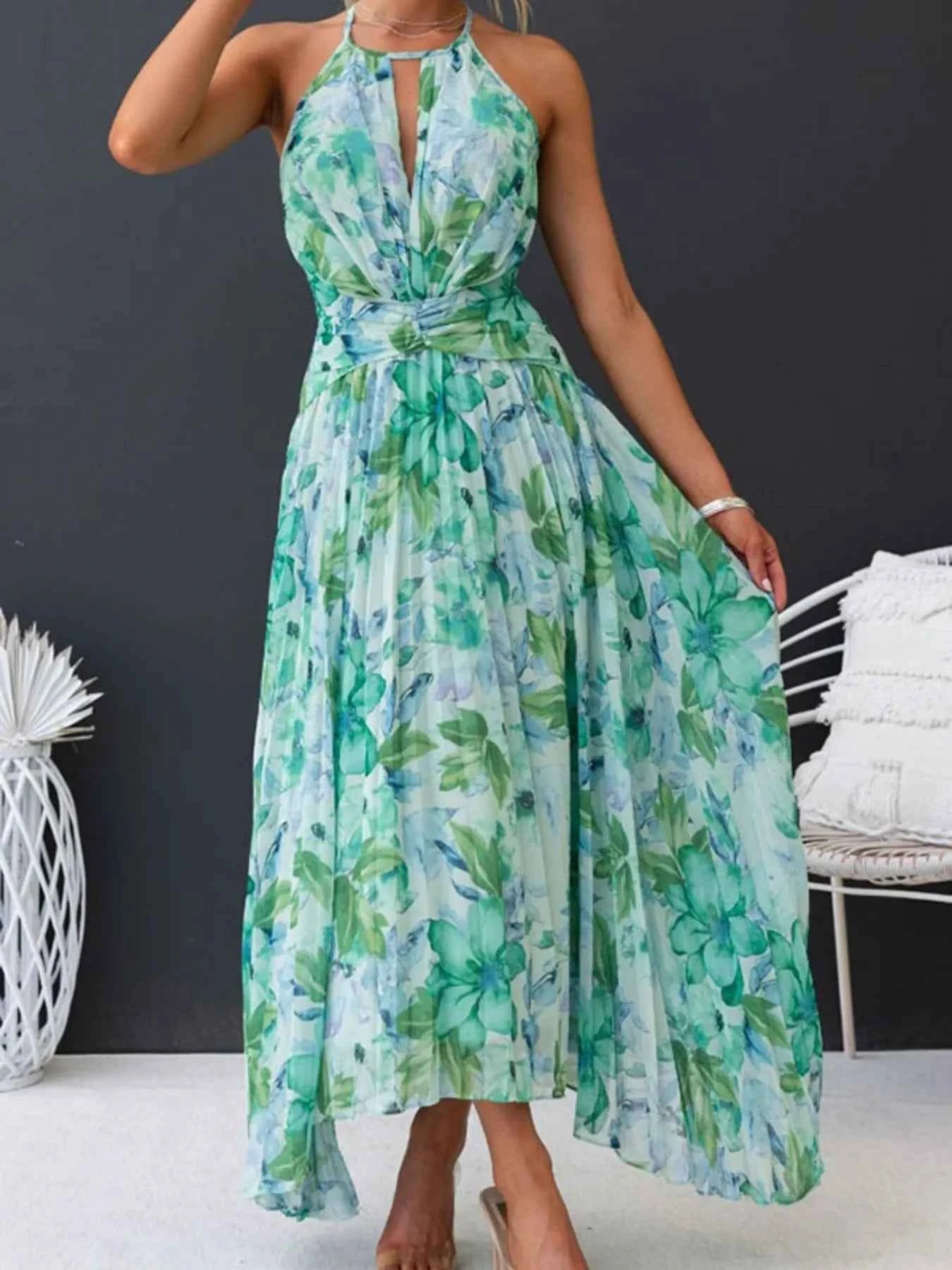 Printed Sleeveless Pleated Dress.