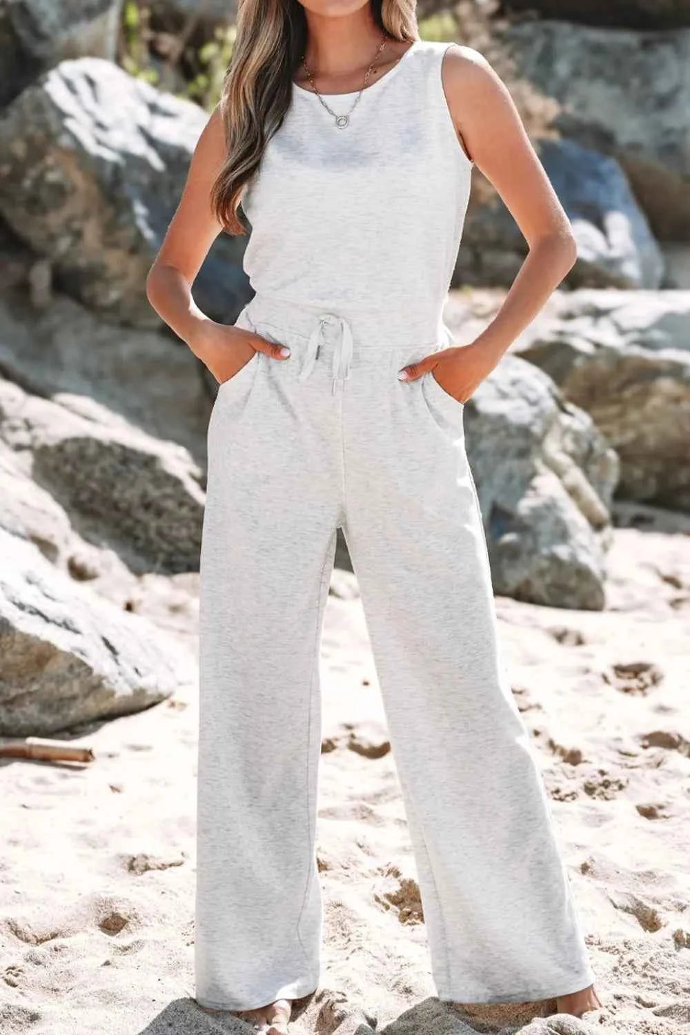 Solid Color High Waist Sleeveless Jumpsuit with Drawstring.