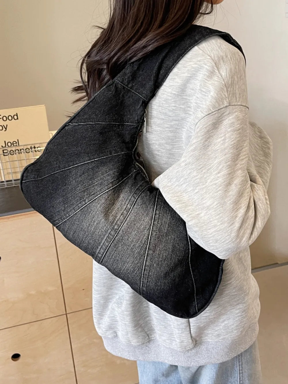 Crescent Shaped Denim Shoulder Bag.