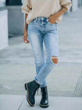 Distressed High Waist Jeans.