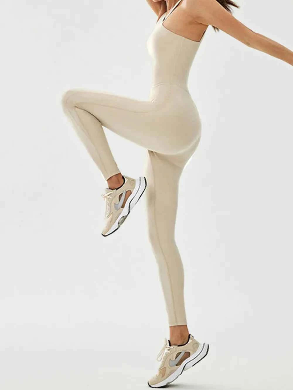 Cutout Asymmetrical Neck Active Jumpsuit.