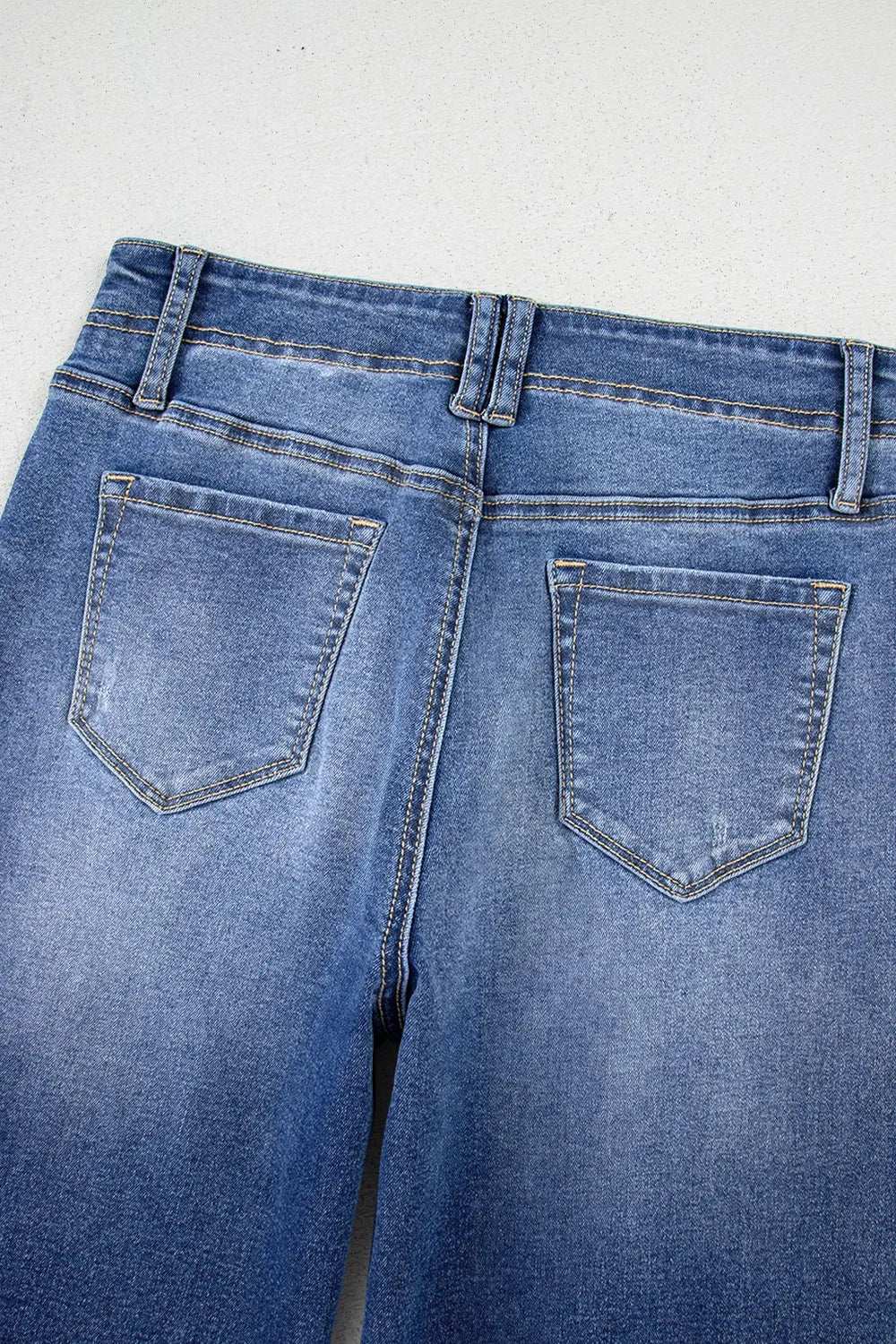 High-Waisted Wide-Leg Vintage Wash Jeans.