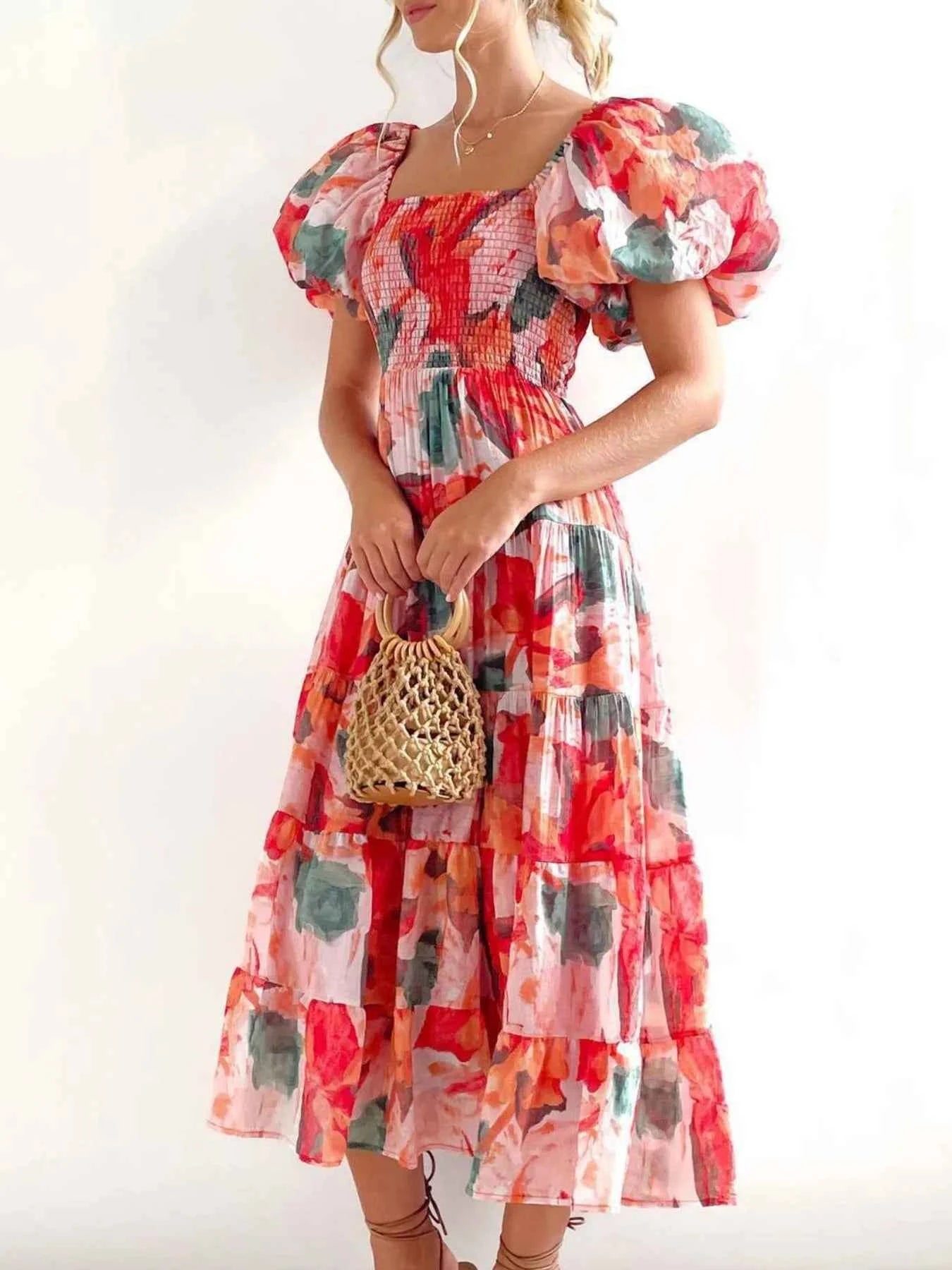 Floral Smocked Puff Sleeve Tiered Dress.