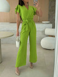 Surplice Wide Leg Belted Jumpsuit.