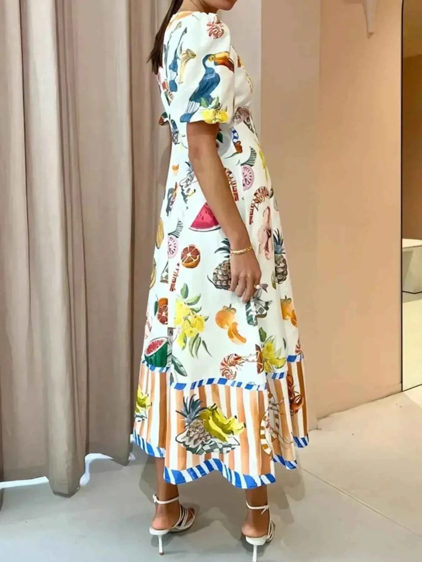 Printed Round Neck Puff Sleeve Dress.