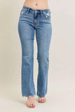 Judy Blue Plus Size Mid Rise Bootcut Jeans with Destroyed Hem.