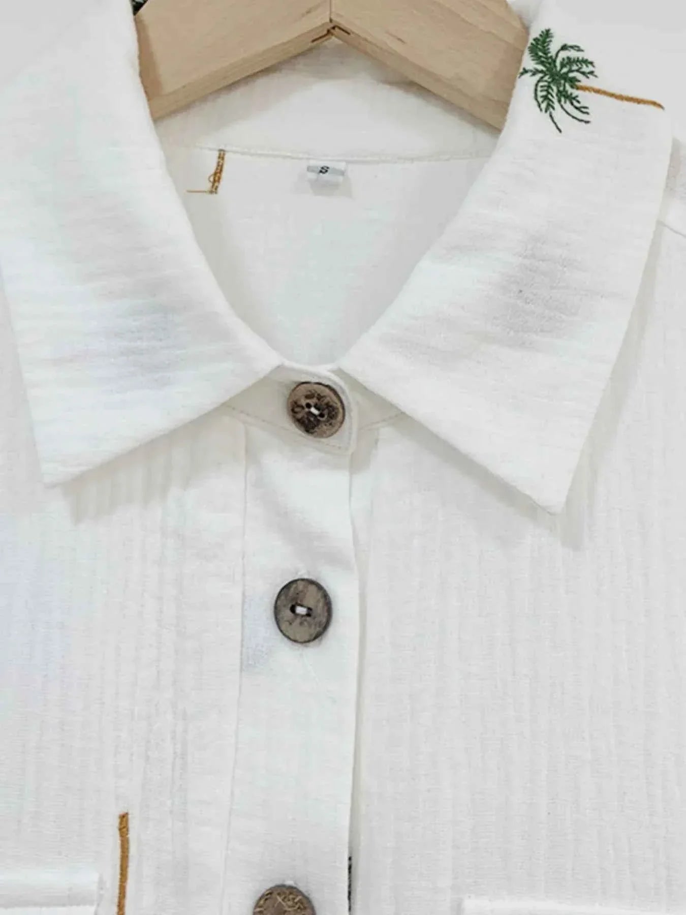 Palm Tree Print Short Sleeve Button-Up Romper with Belt.