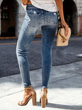 Distressed Skinny Jeans.