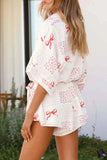 Printed Tie Waist Romper.