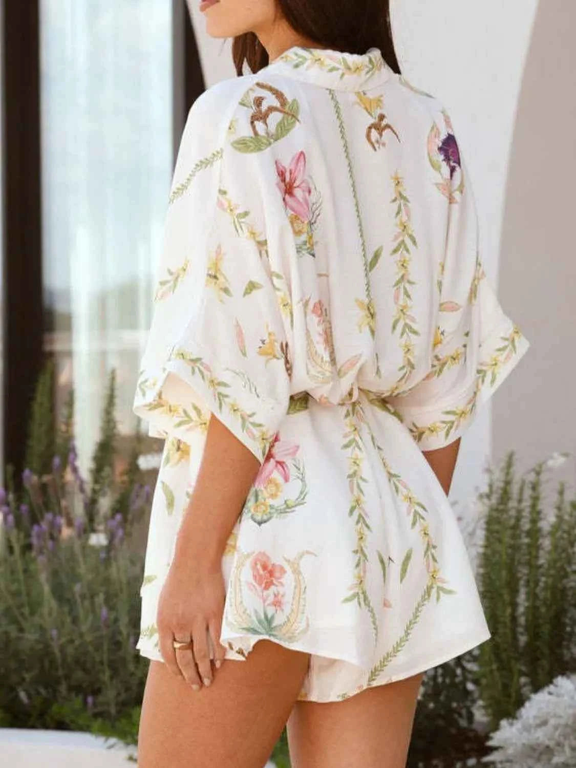 Printed Tie Waist Half Sleeve Romper.