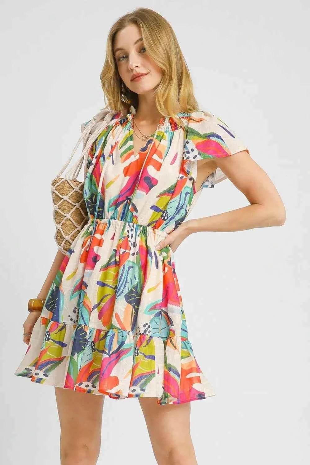 Umgee Tropical Print Tie Neck Ruffled Hem Mini Dress.