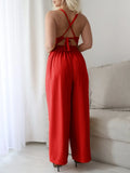 Devine Tie Back Backless Crisscross Jumpsuit.