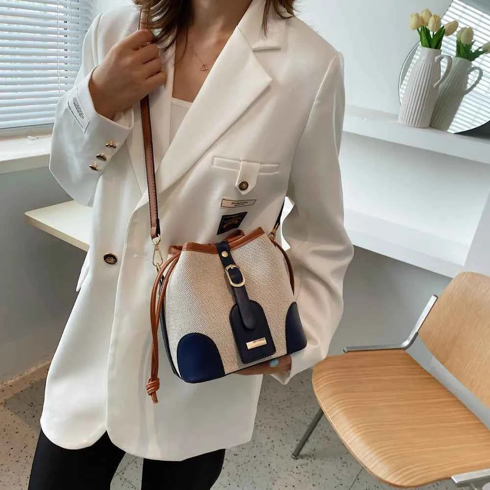 Straw Braided Adjustable Strap Crossbody Bag.