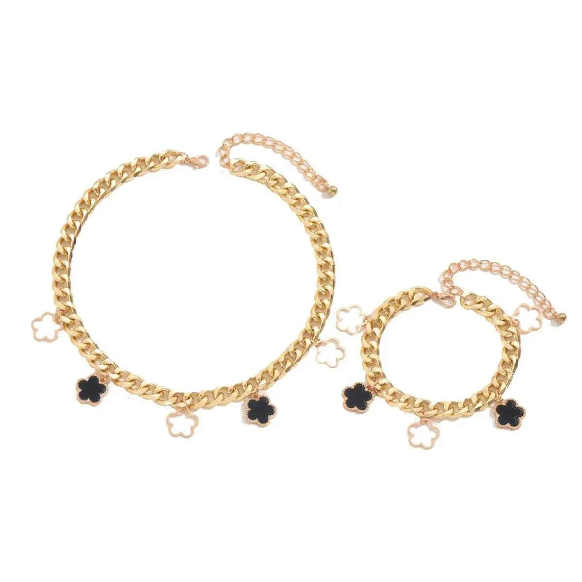 2 Piece Clover Charm Jewelry Set: Necklace & Bracelet.
