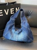 Crescent Shaped Denim Shoulder Bag.