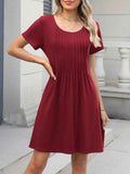 Pleated Front Round Neck Swing Dress.