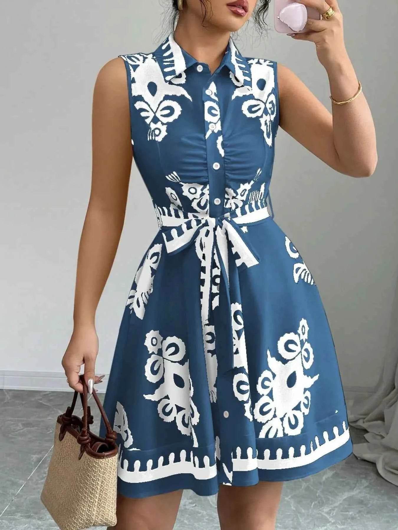 Printed Sleeveless Tie Waist Mini Dress.