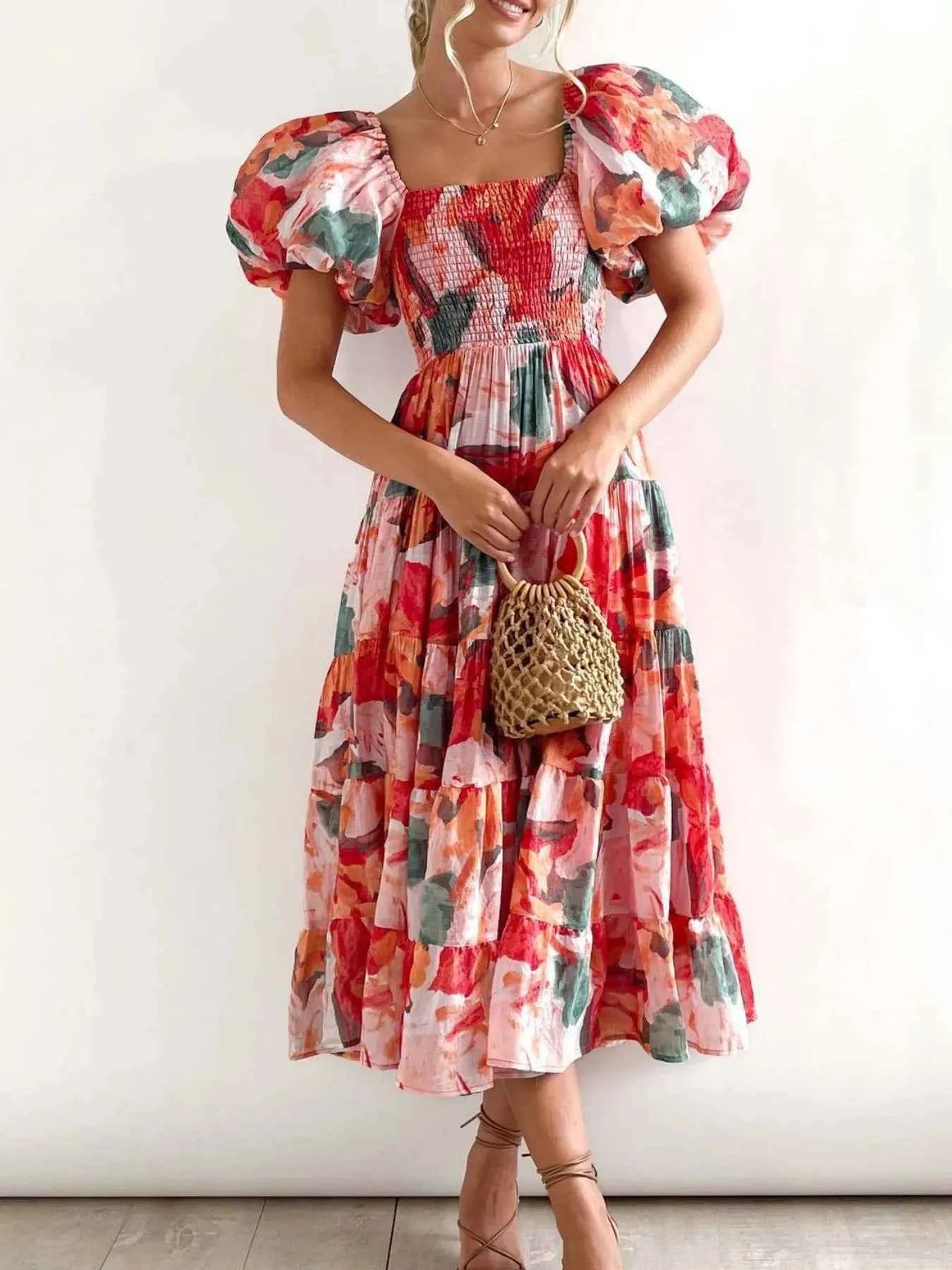 Floral Smocked Puff Sleeve Tiered Dress.