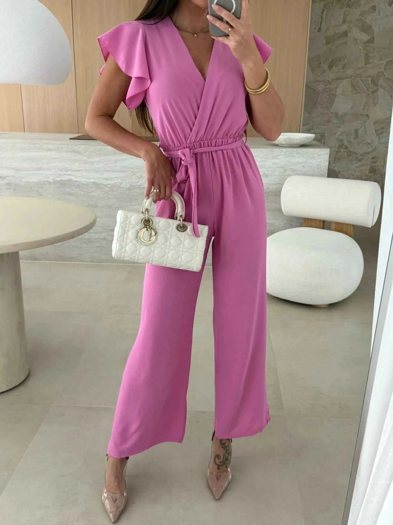 Surplice Wide Leg Belted Jumpsuit.